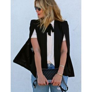 Black brand new cape jacket